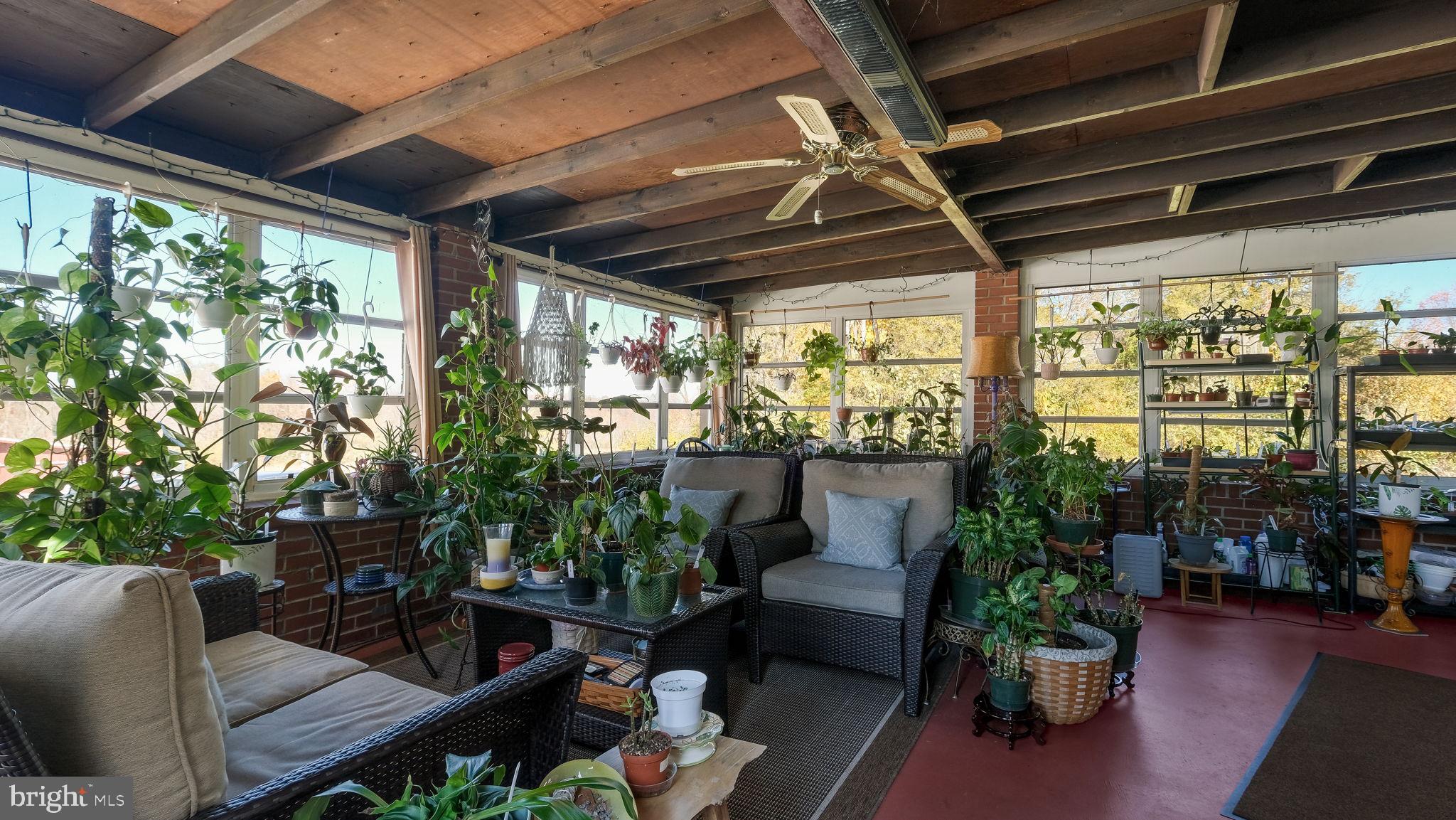 7078 Easton Road Pipersville, PA 18947 - Photo 26 of 45 a outdoor living space with furniture and garden view