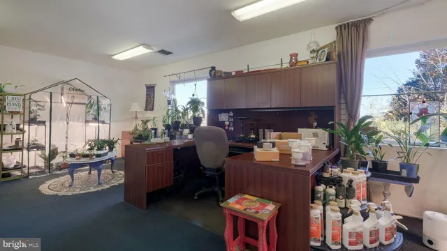 a kitchen with stove and cabinets