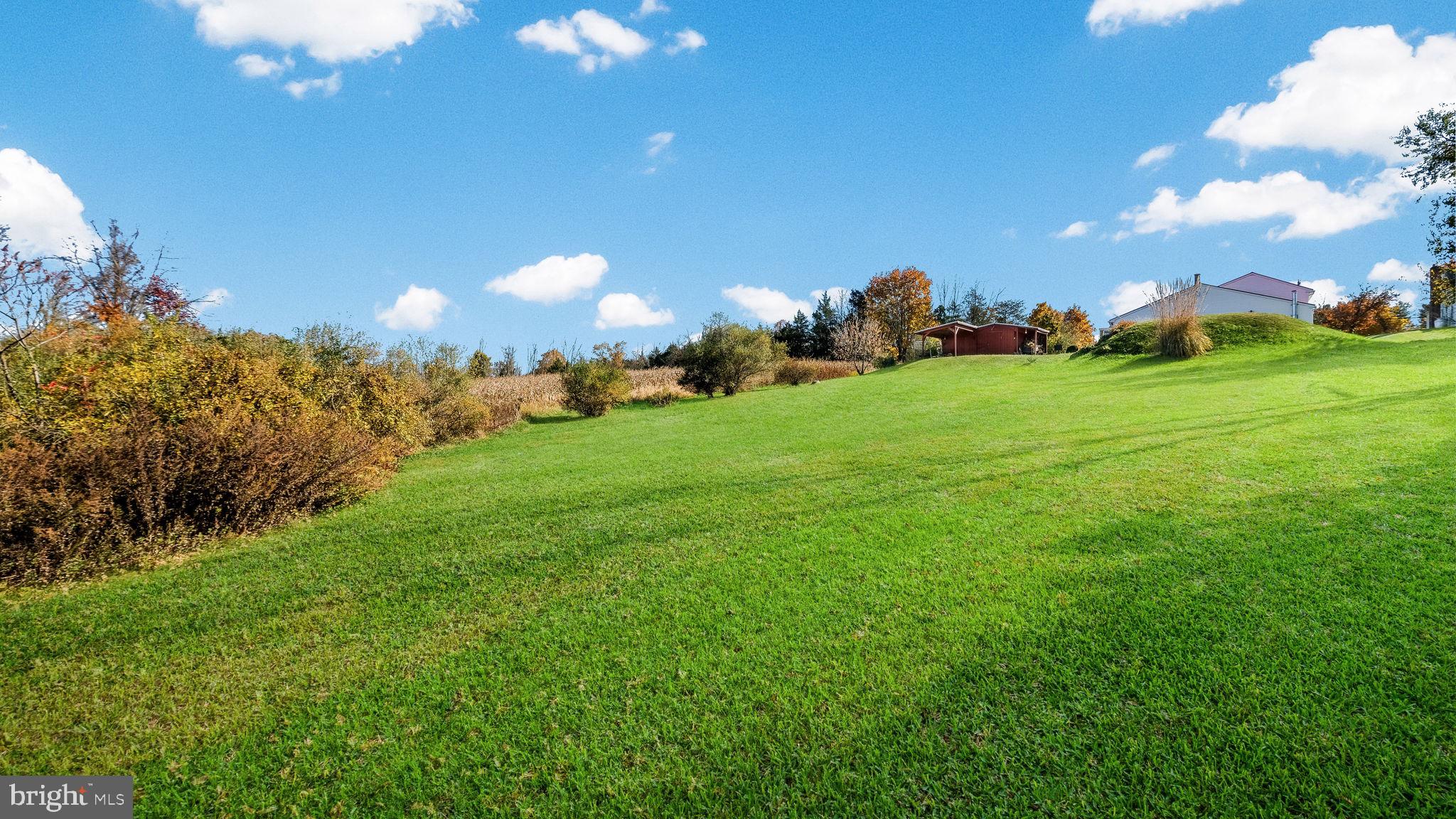7078 Easton Road Pipersville, PA 18947 - Photo 43 of 45 a view of a golf course with a lake