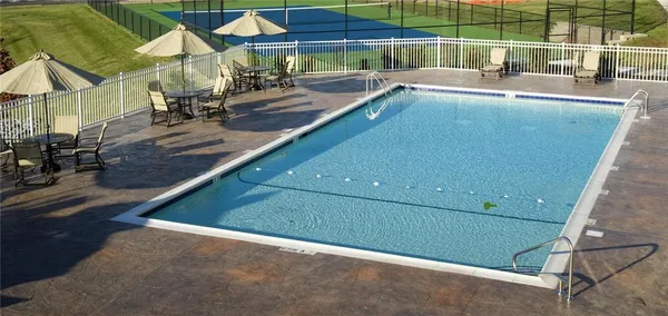 an outdoor space with swimming pool