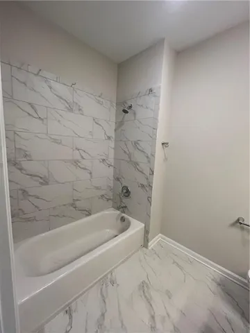 a bathroom with a bathtub