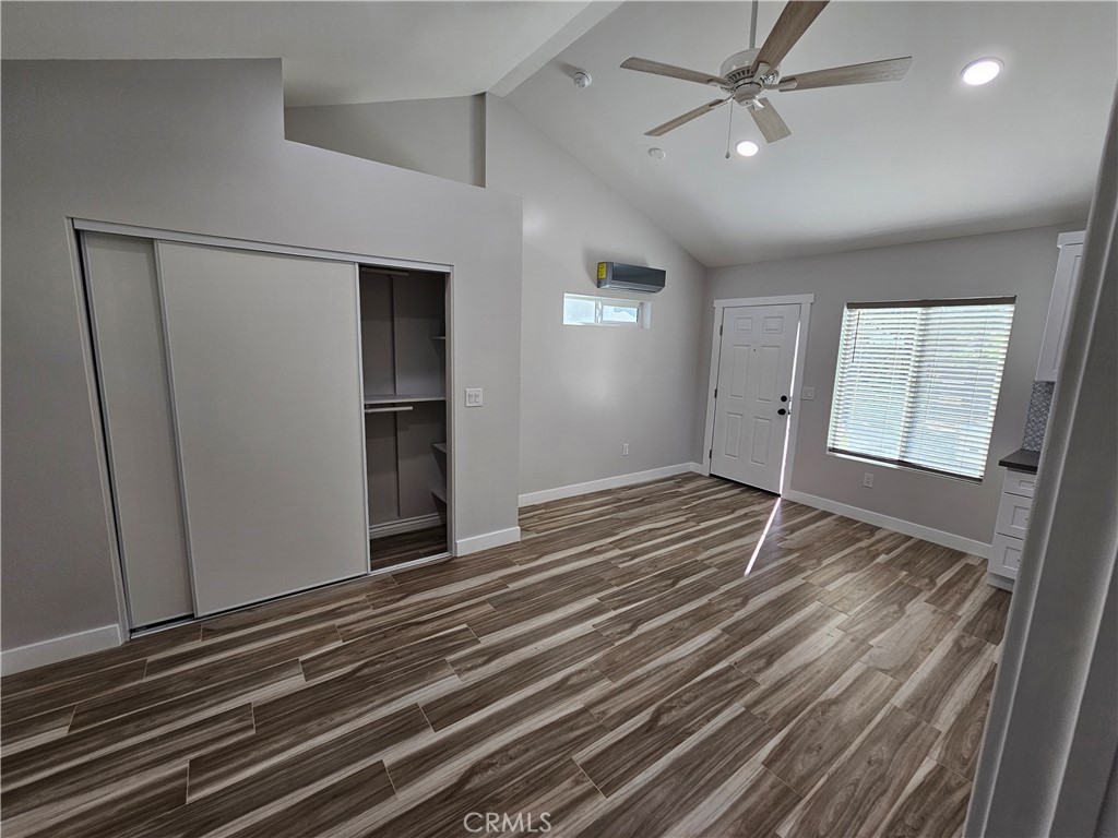 6570 Mt Diablo Avenue Riverside, CA 92506 - Photo 14 of 15 wooden floor in an empty room with a window