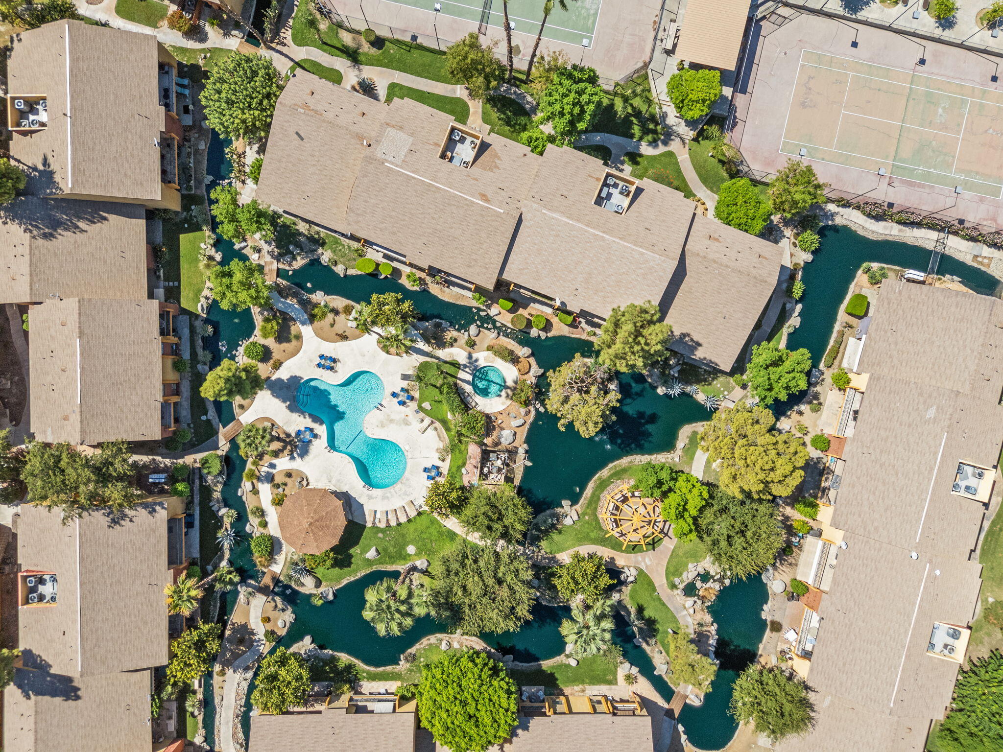 48255 Monroe Street, Unit 59 Indio, CA 92201 - Photo 30 of 58 an aerial view of a house with a lot of flower plants