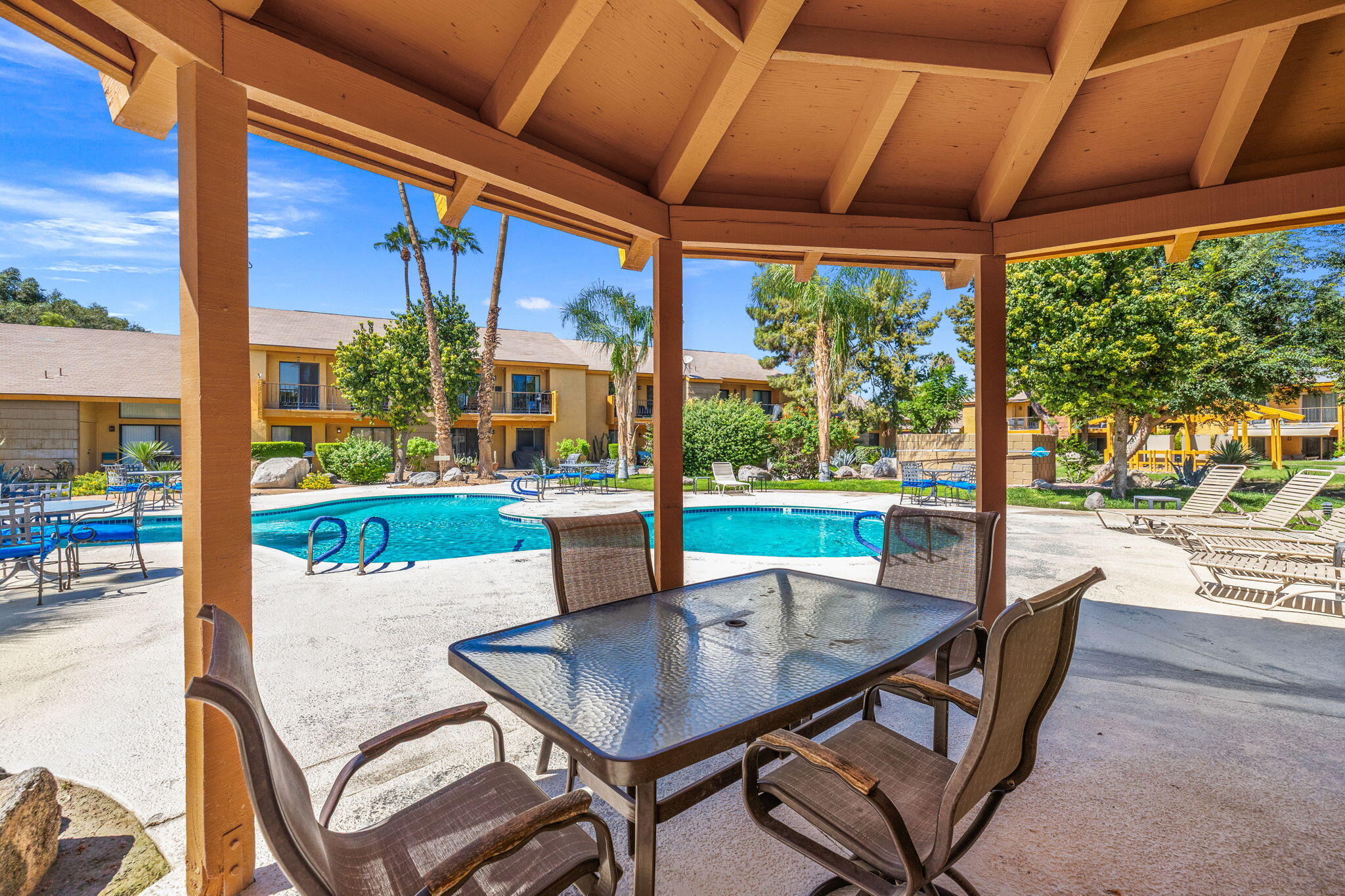 48255 Monroe Street, Unit 59 Indio, CA 92201 - Photo 44 of 58 a outdoor view with a sitting space