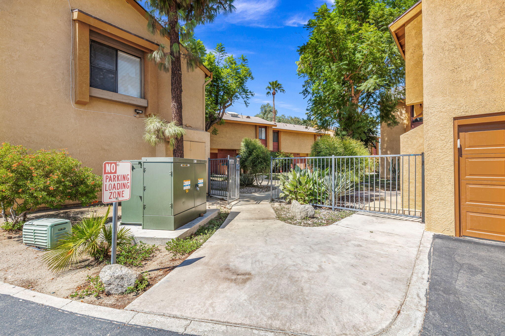 48255 Monroe Street, Unit 59 Indio, CA 92201 - Photo 46 of 58 a view of a chair and table in the backyard