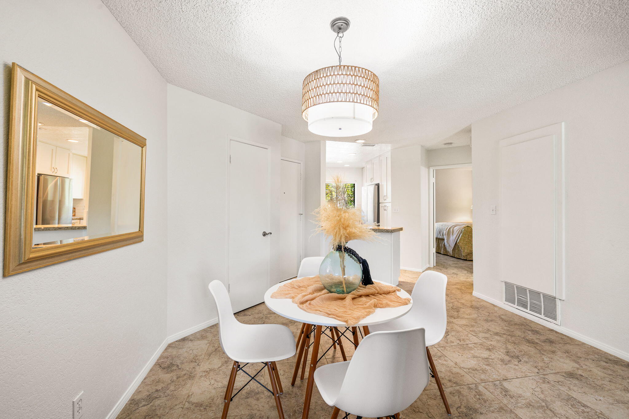 48255 Monroe Street, Unit 59 Indio, CA 92201 - Photo 7 of 58 a view of a dining room with furniture window and wooden floor