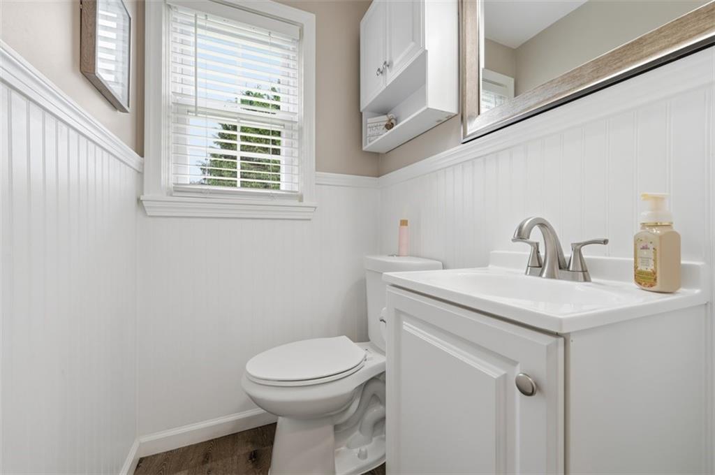 129 Meadowbrook Road Renfrew, PA 16053 - Photo 9 of 45 a bathroom with a sink a toilet and a window