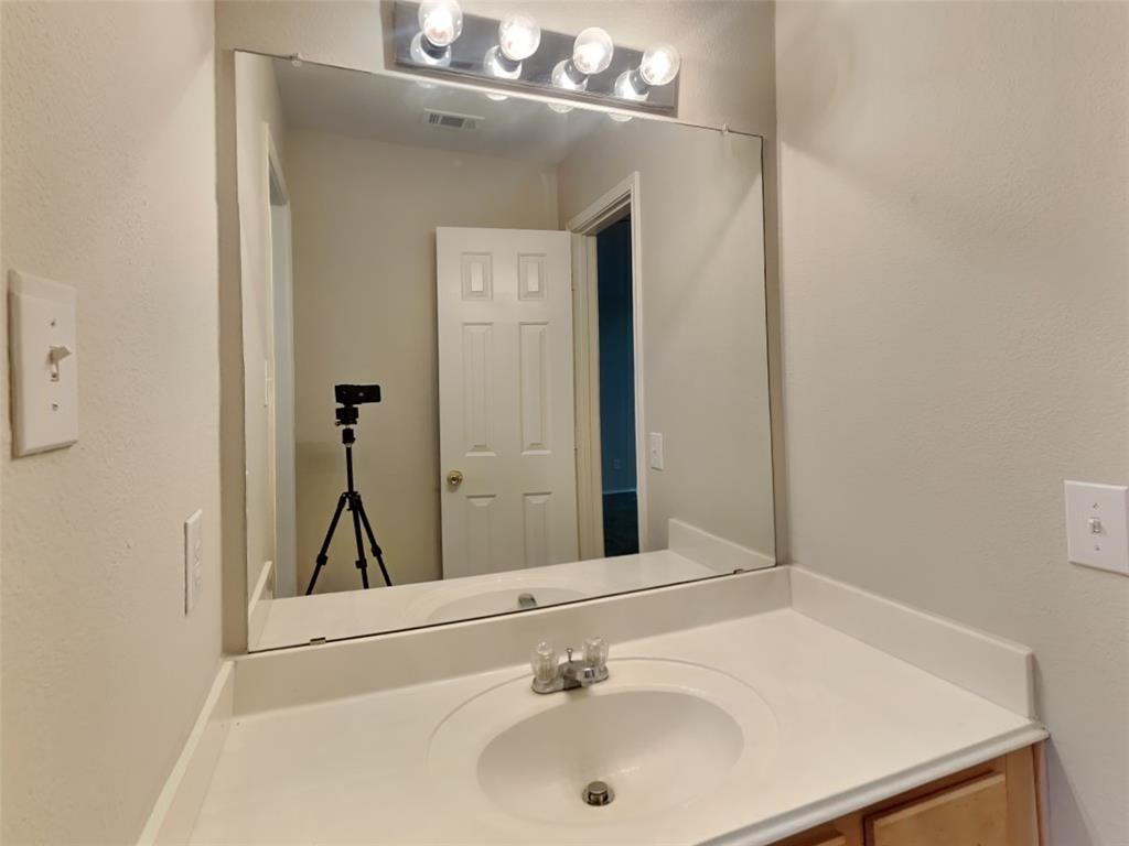 4808 Winterview Drive Mansfield, TX 76063 - Photo 19 of 32 Bathroom with visible vents and vanity