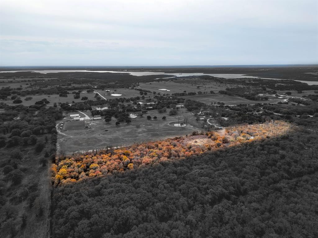2780 Pear Orchard Road Granbury, TX 76048 - Photo 1 of 40 an aerial view of a house with a yard
