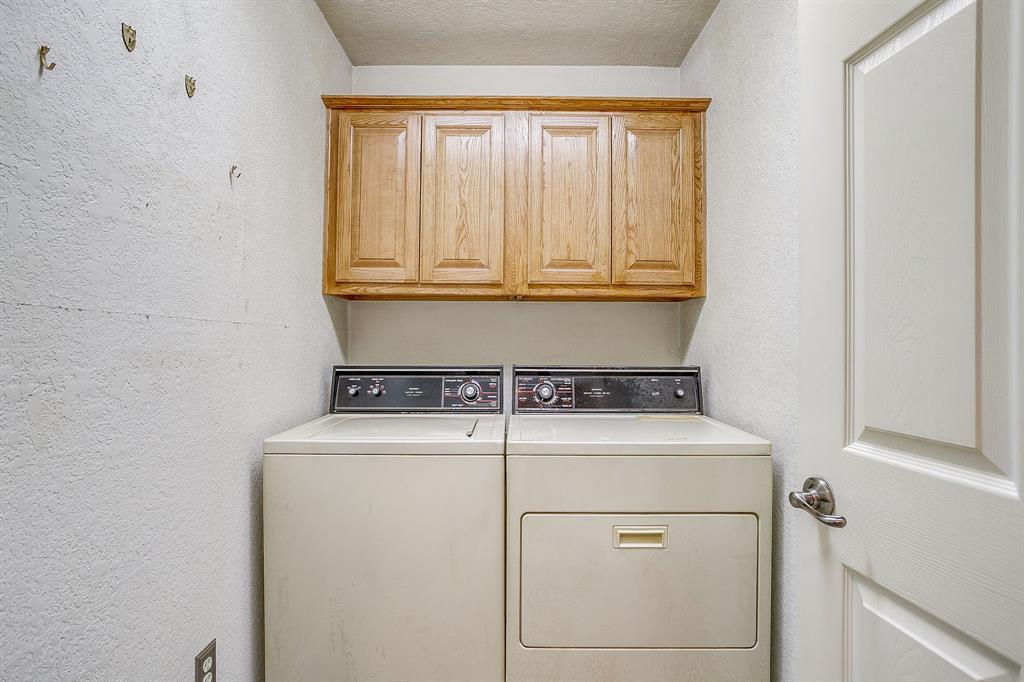 2780 Pear Orchard Road Granbury, TX 76048 - Photo 22 of 40 a utility room with dryer and washer