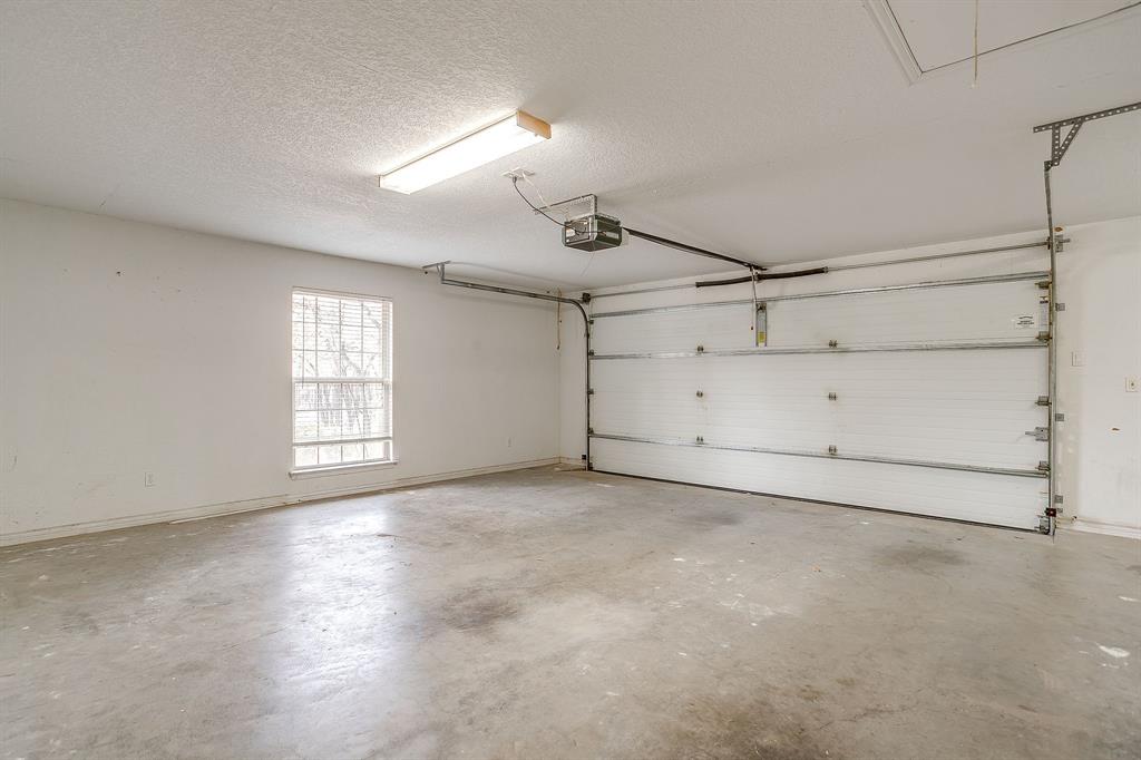 2780 Pear Orchard Road Granbury, TX 76048 - Photo 23 of 40 a view of a garage room