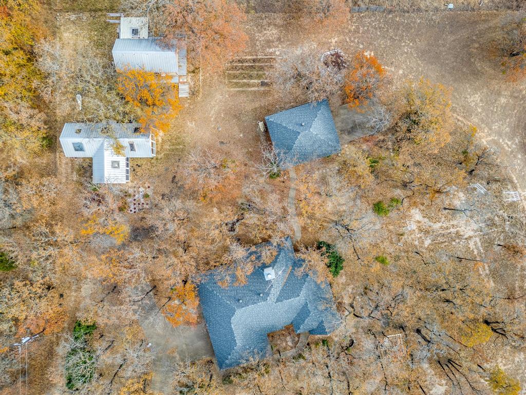 2780 Pear Orchard Road Granbury, TX 76048 - Photo 3 of 40 a vase of flowers sitting on a table