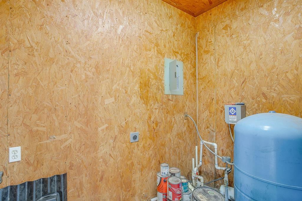 2780 Pear Orchard Road Granbury, TX 76048 - Photo 31 of 40 a bathroom with a sink and a shower curtain