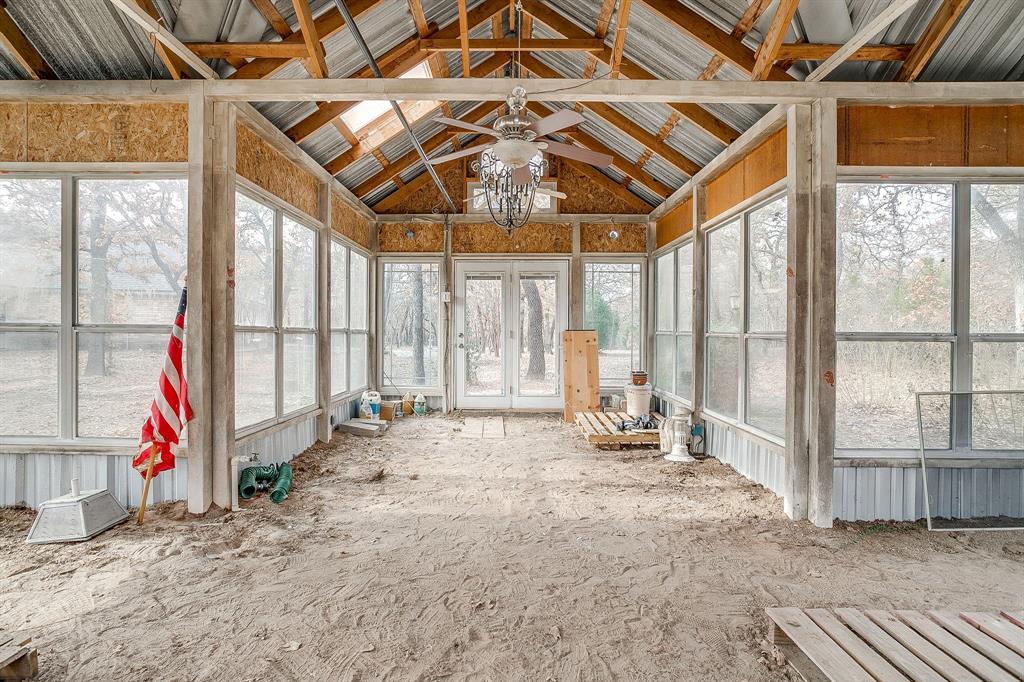 2780 Pear Orchard Road Granbury, TX 76048 - Photo 33 of 40 a very nice looking room with a large window
