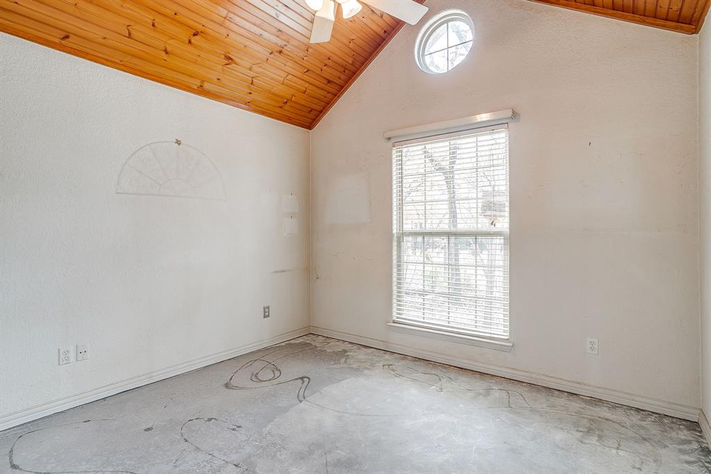 2780 Pear Orchard Road Granbury, TX 76048 - Photo 8 of 40 an empty room with a window