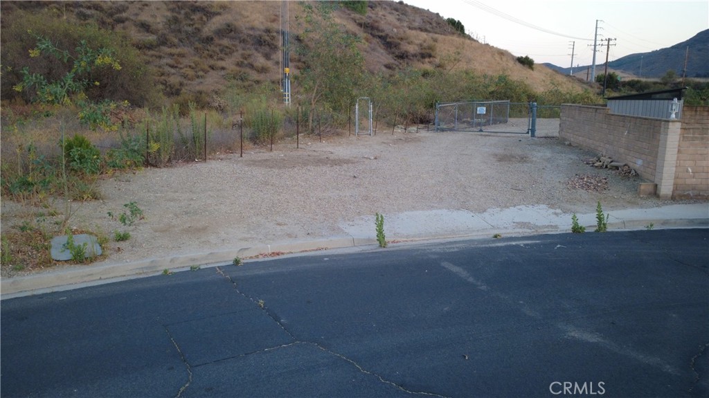 6422 Beragan Street Moorpark, CA 93021 - Photo 6 of 26 a view of a road with a yard