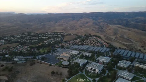 an aerial view of residential house with parking space