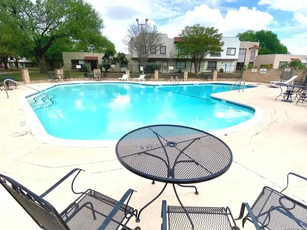 a view of swimming pool with an outdoor space
