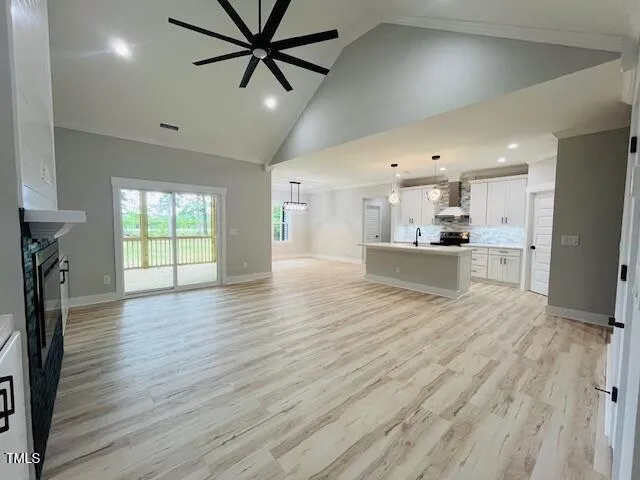 a view of a kitchen with a sink and a window