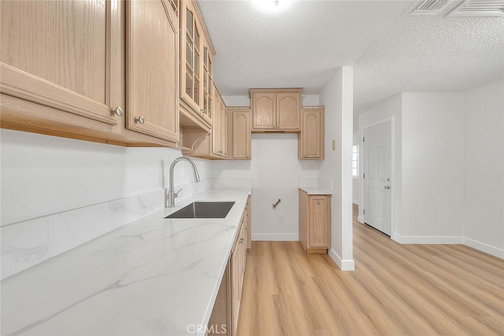 22133 Thunderbird Road Apple Valley, CA 92307 - Photo 15 of 23 Kitchen. Kitchen has new stainless steel appliances