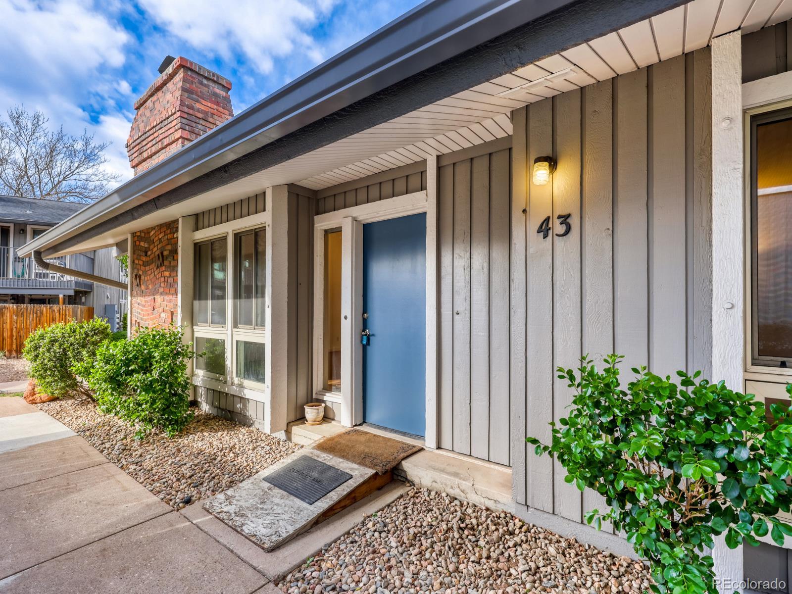 6495 East Happy Canyon Road, Unit 43 Denver, CO 80237 - Photo 1 of 28 a view of house with entryway
