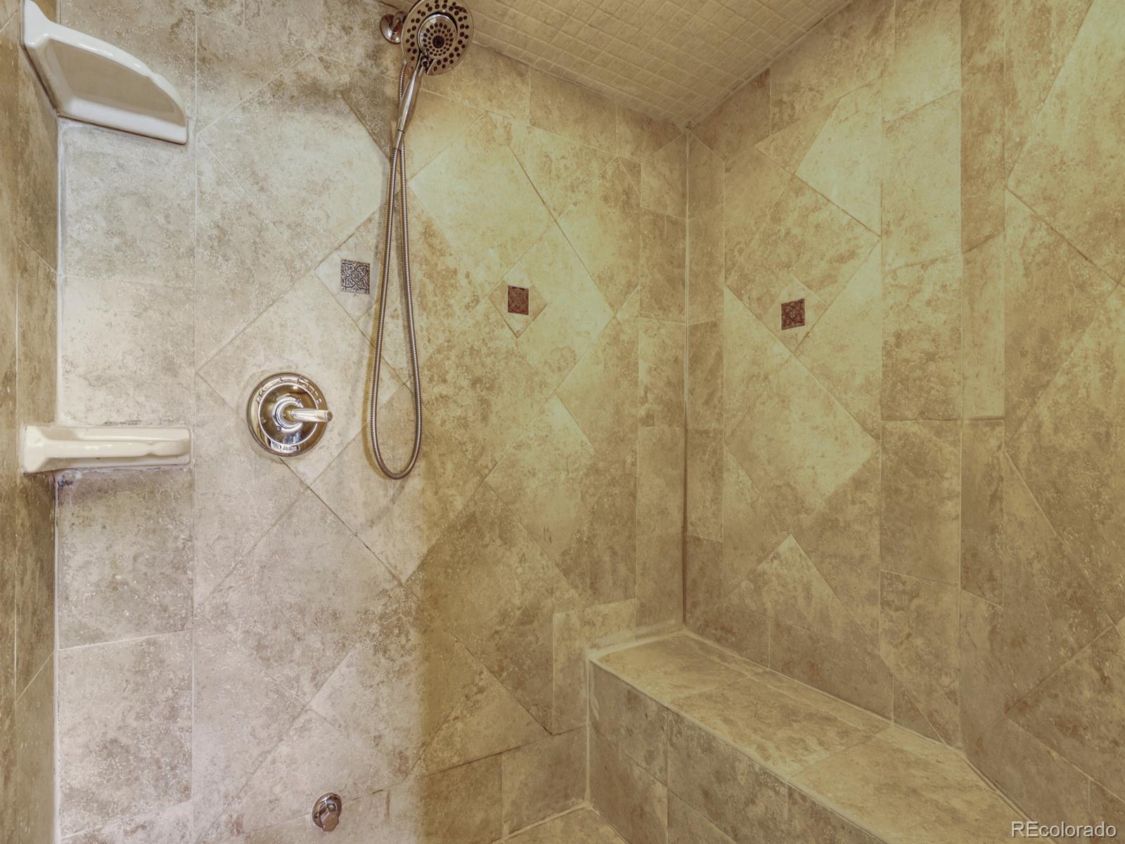6495 East Happy Canyon Road, Unit 43 Denver, CO 80237 - Photo 15 of 28 a bathroom with a shower
