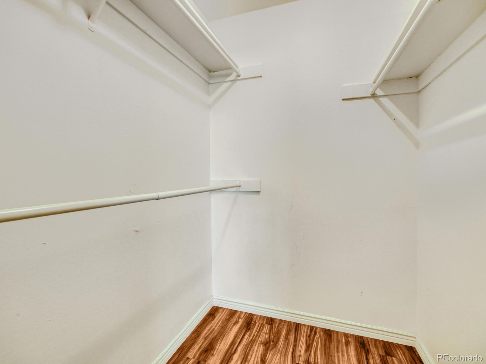 6495 East Happy Canyon Road, Unit 43 Denver, CO 80237 - Photo 23 of 28 a view of a room with racks on the wall