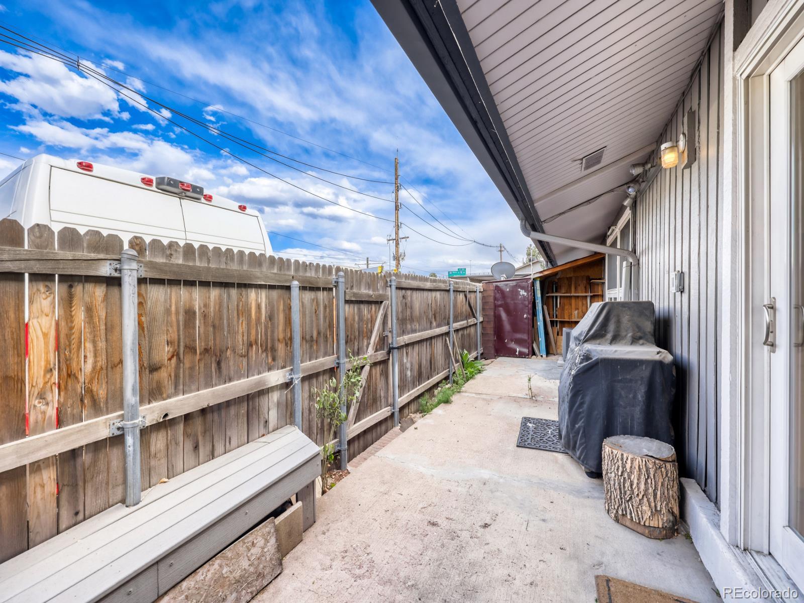 6495 East Happy Canyon Road, Unit 43 Denver, CO 80237 - Photo 25 of 28 a view of a balcony with furniture