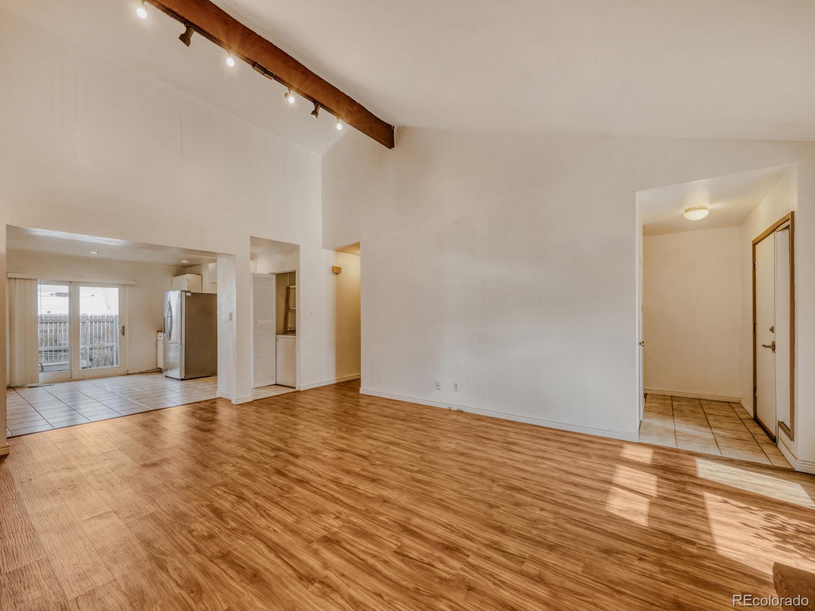 6495 East Happy Canyon Road, Unit 43 Denver, CO 80237 - Photo 4 of 28 a view of an empty room with glass door