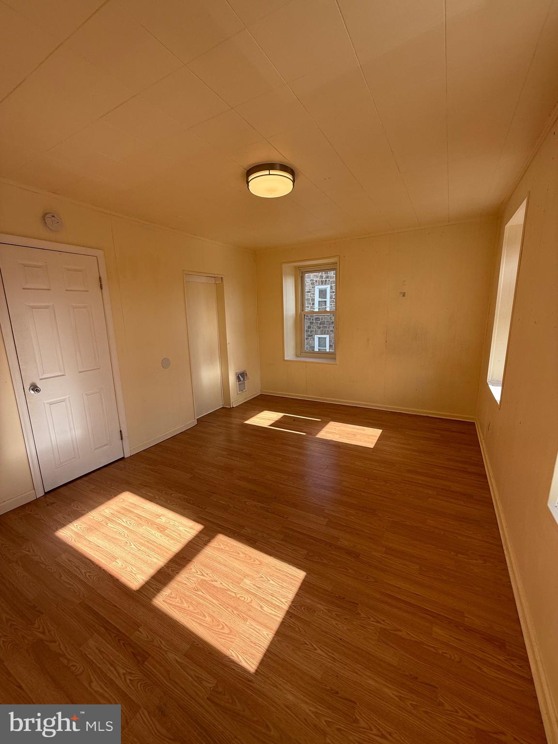 403 South Main Street Ambler, PA 19002 - Photo 17 of 37 a view of a room with wooden floor and window