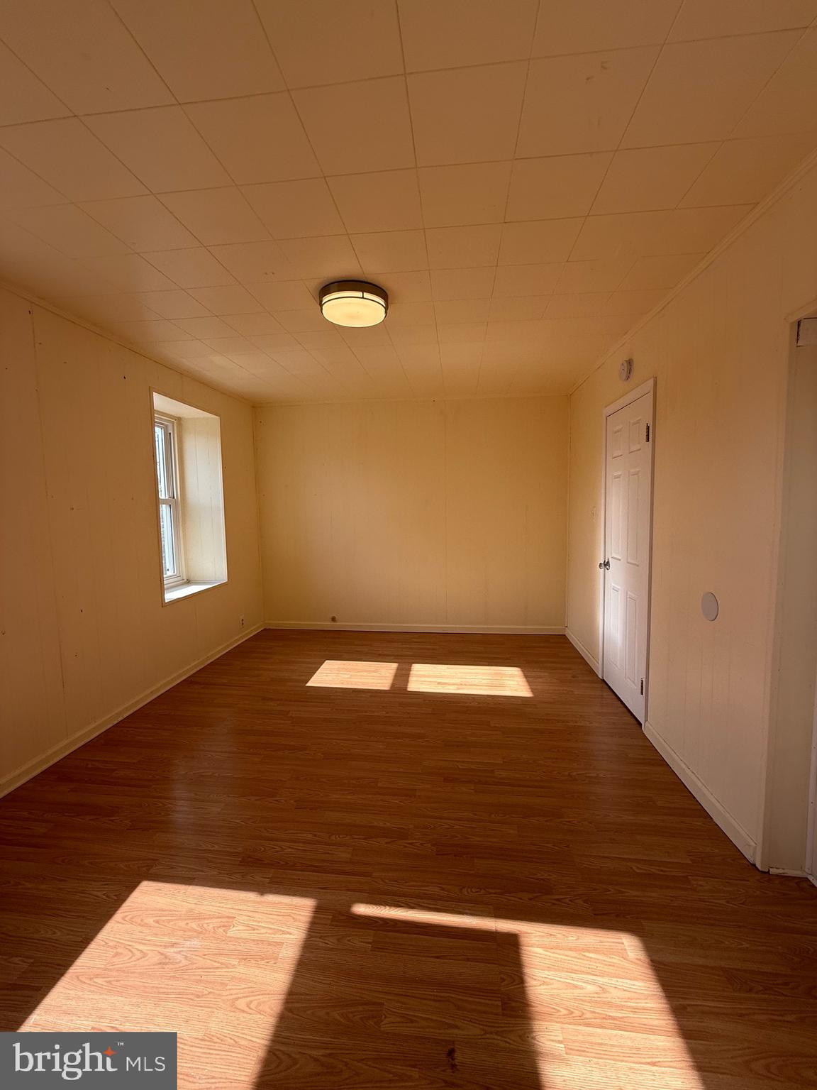 403 South Main Street Ambler, PA 19002 - Photo 18 of 37 a view of empty room with wooden floor and fan