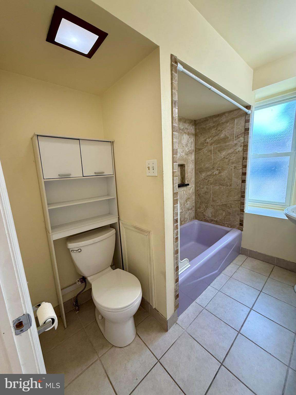 403 South Main Street Ambler, PA 19002 - Photo 22 of 37 a bathroom with a toilet and a bathtub