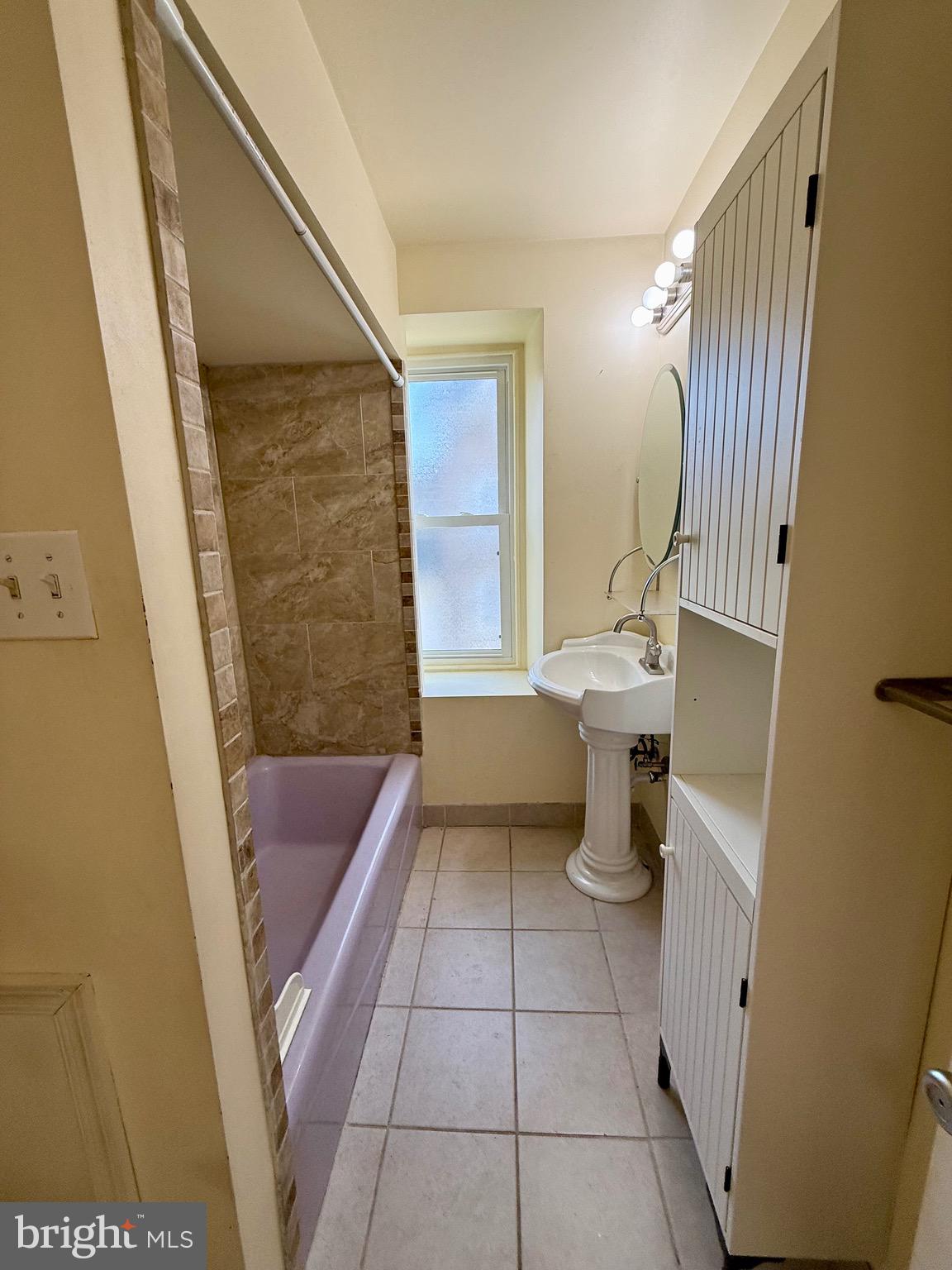 403 South Main Street Ambler, PA 19002 - Photo 23 of 37 a bathroom with a sink a toilet and tub