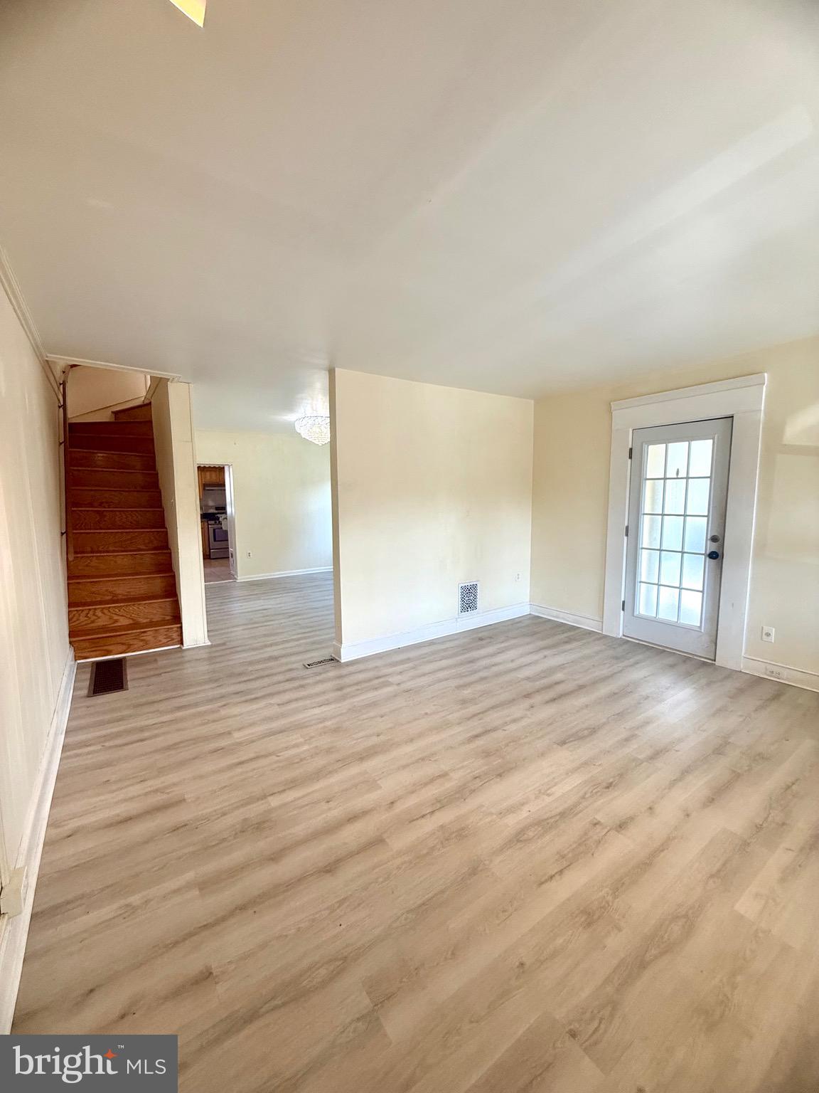 403 South Main Street Ambler, PA 19002 - Photo 6 of 37 a view of empty room with wooden floor and window