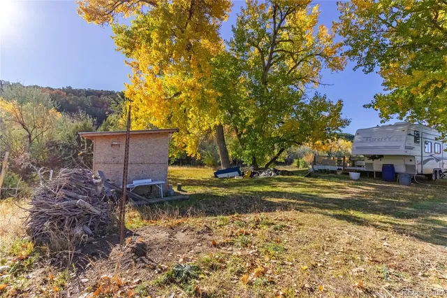 a view of a fountain in front of a house
