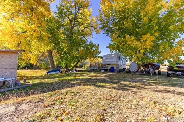 a view of a pathway with a backyard of the house