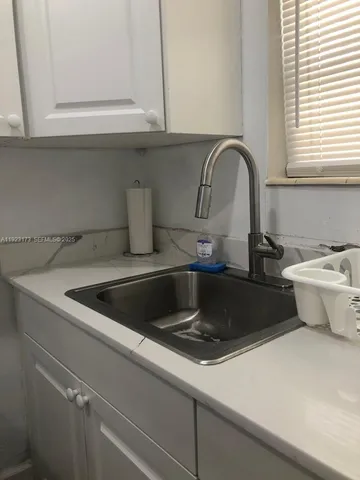 a close view of a sink and tap
