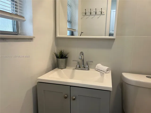 a bathroom with a sink and a toilet