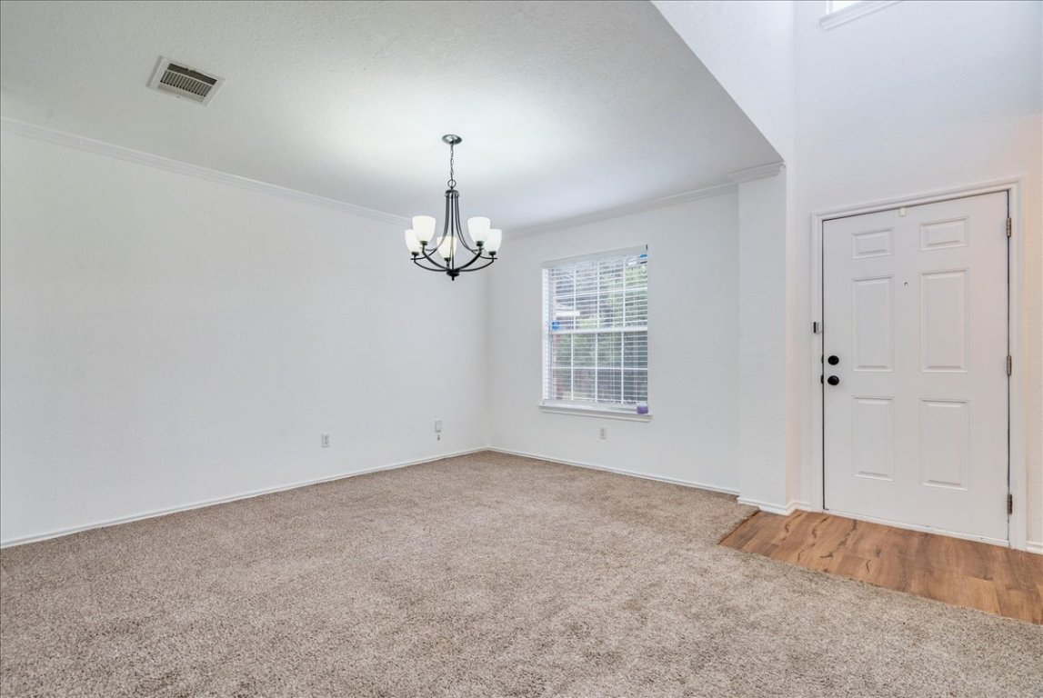 18436 Wind Tree Lane Elgin, TX 78621 - Photo 2 of 34 a view of empty room with windows