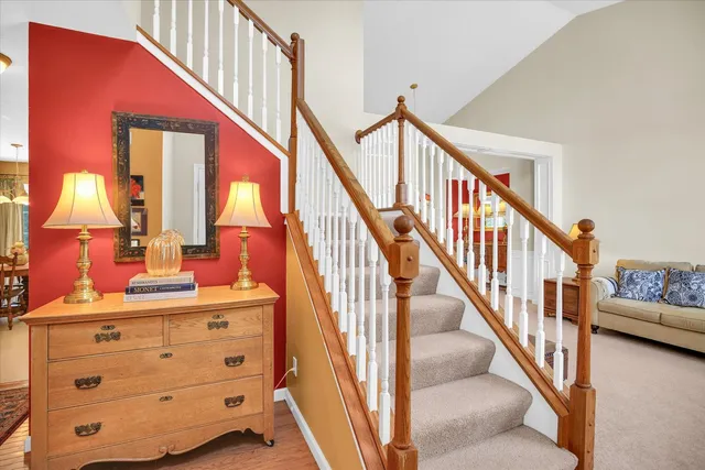 a view of a hallway with stairs