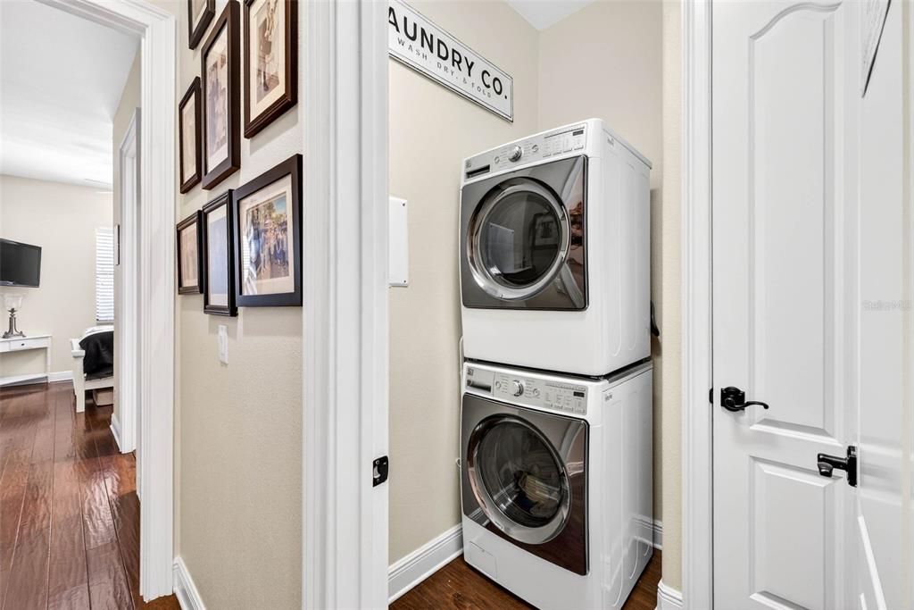 105 Wimbledon Court Redington Shores, FL 33708 - Photo 43 of 89 a view of a hallway with washer and dryer