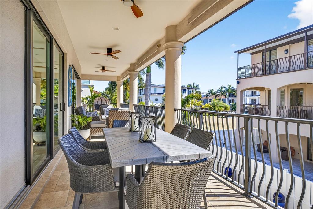 105 Wimbledon Court Redington Shores, FL 33708 - Photo 47 of 89 a view of a dining room with furniture window and wooden floor