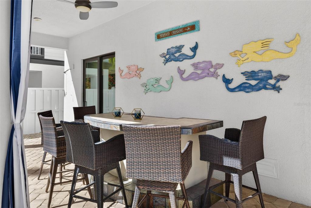 105 Wimbledon Court Redington Shores, FL 33708 - Photo 56 of 89 a view of a dining room with furniture and window