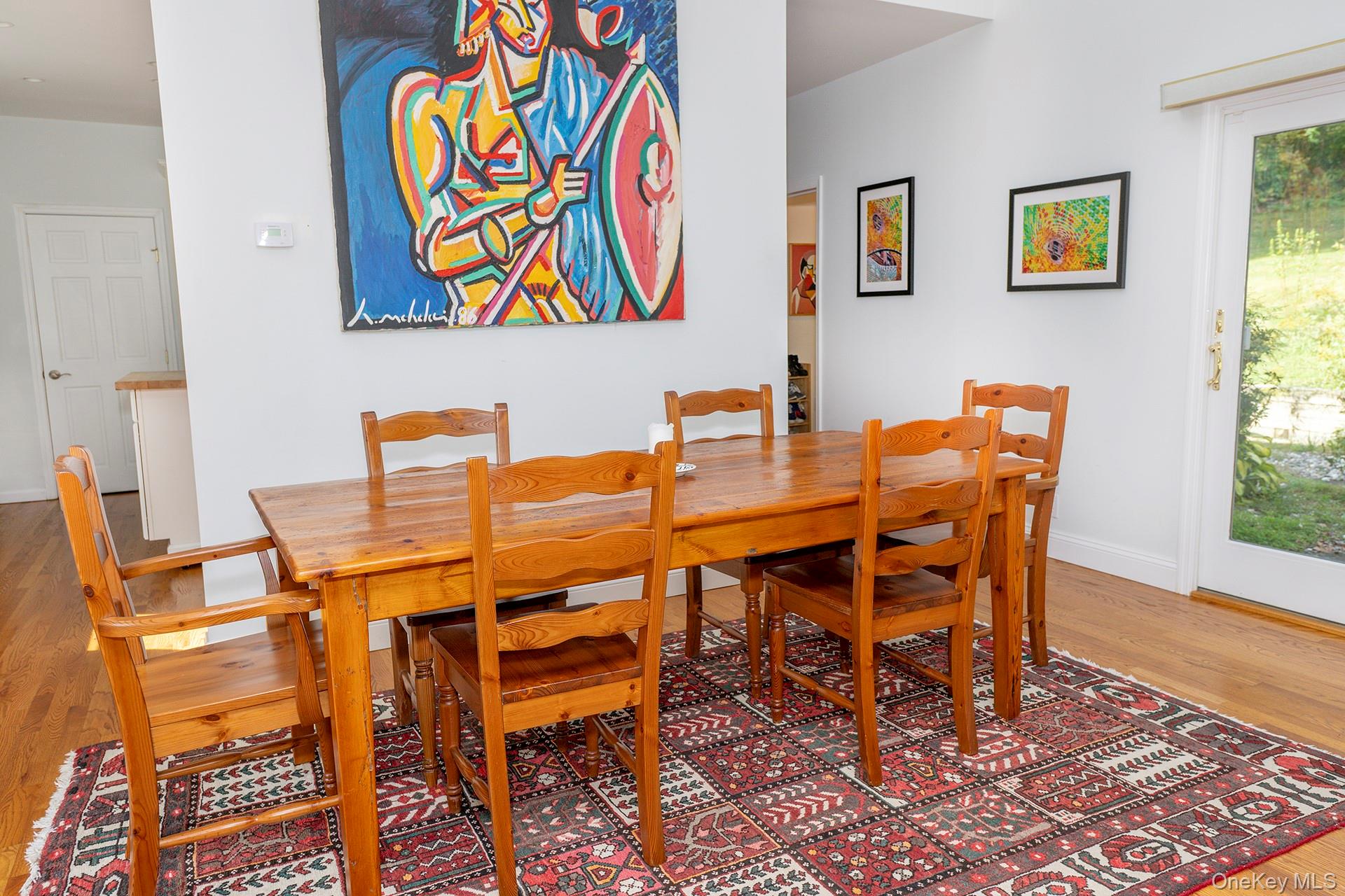 28 Clinton Corners Road Salt Point, NY 12578 - Photo 11 of 41 a dining room with furniture and wooden floor