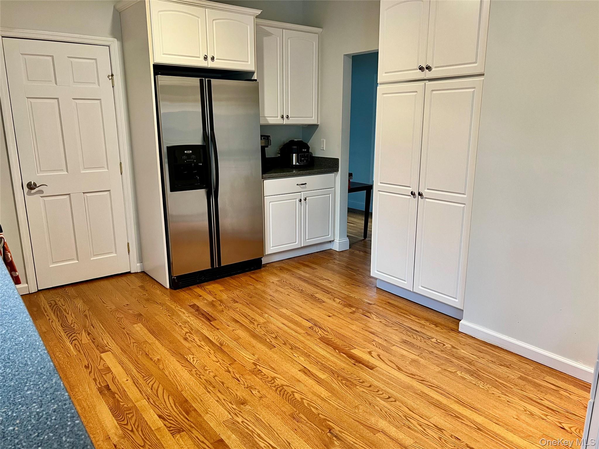 28 Clinton Corners Road Salt Point, NY 12578 - Photo 13 of 41 a view of a kitchen with wooden floor and electronic appliances