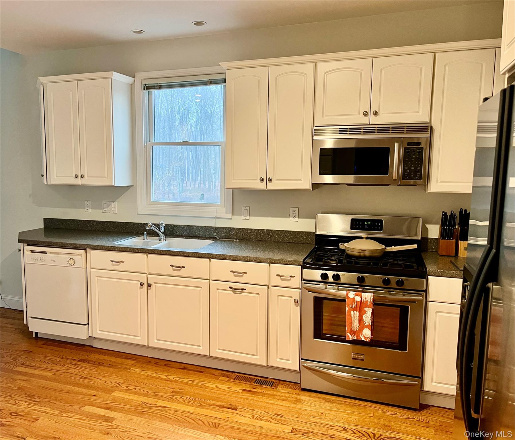 28 Clinton Corners Road Salt Point, NY 12578 - Photo 14 of 41 a kitchen with stainless steel appliances granite countertop a stove a microwave and a sink