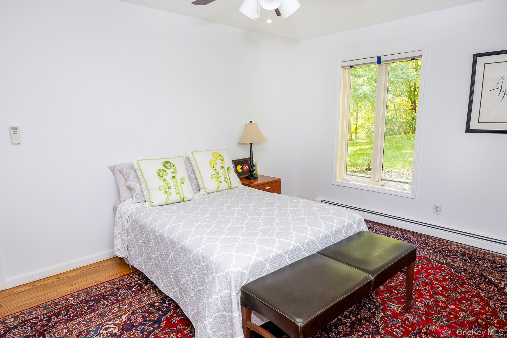 28 Clinton Corners Road Salt Point, NY 12578 - Photo 18 of 41 a bedroom with a bed and a window