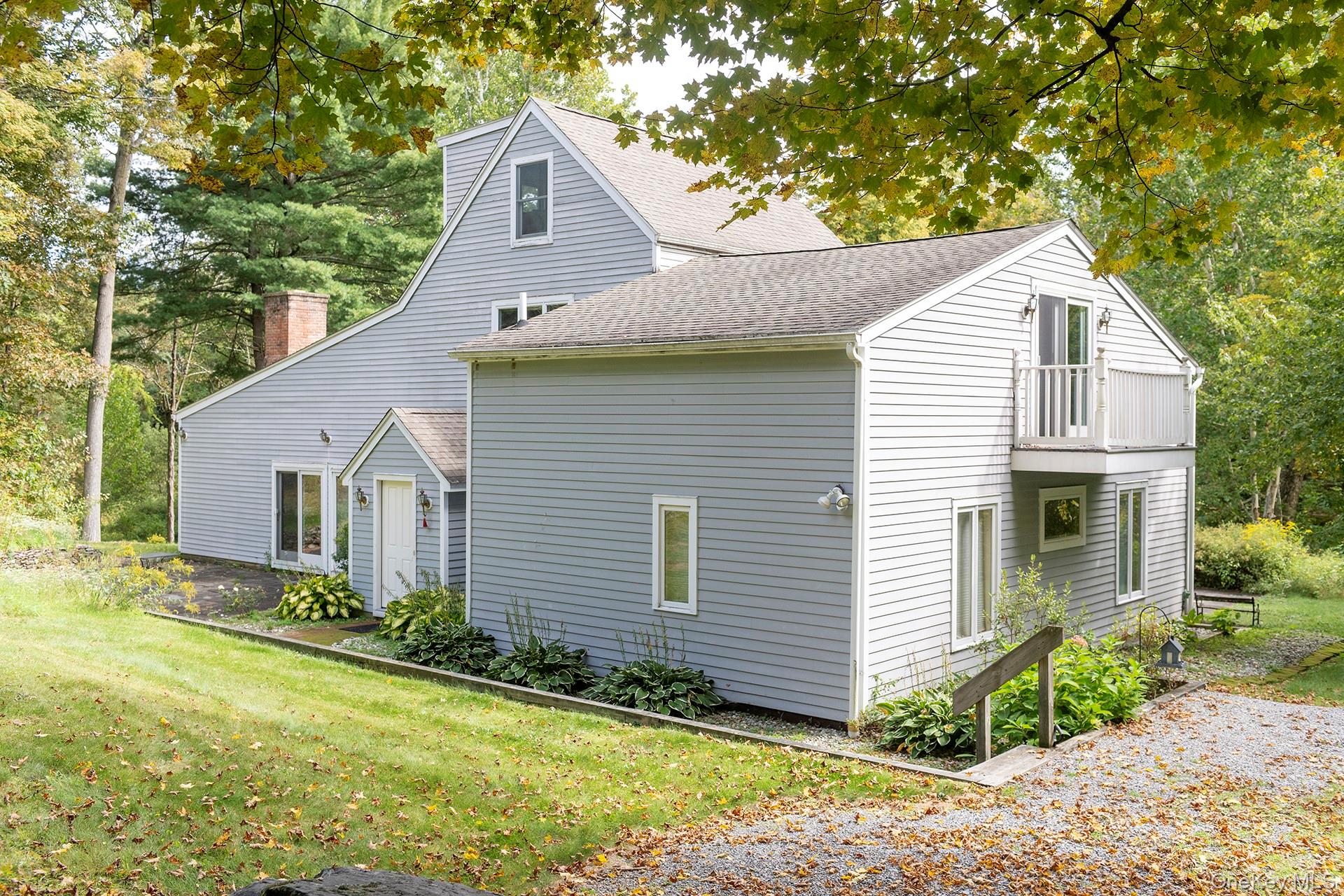 28 Clinton Corners Road Salt Point, NY 12578 - Photo 3 of 41 a front view of a house with garden