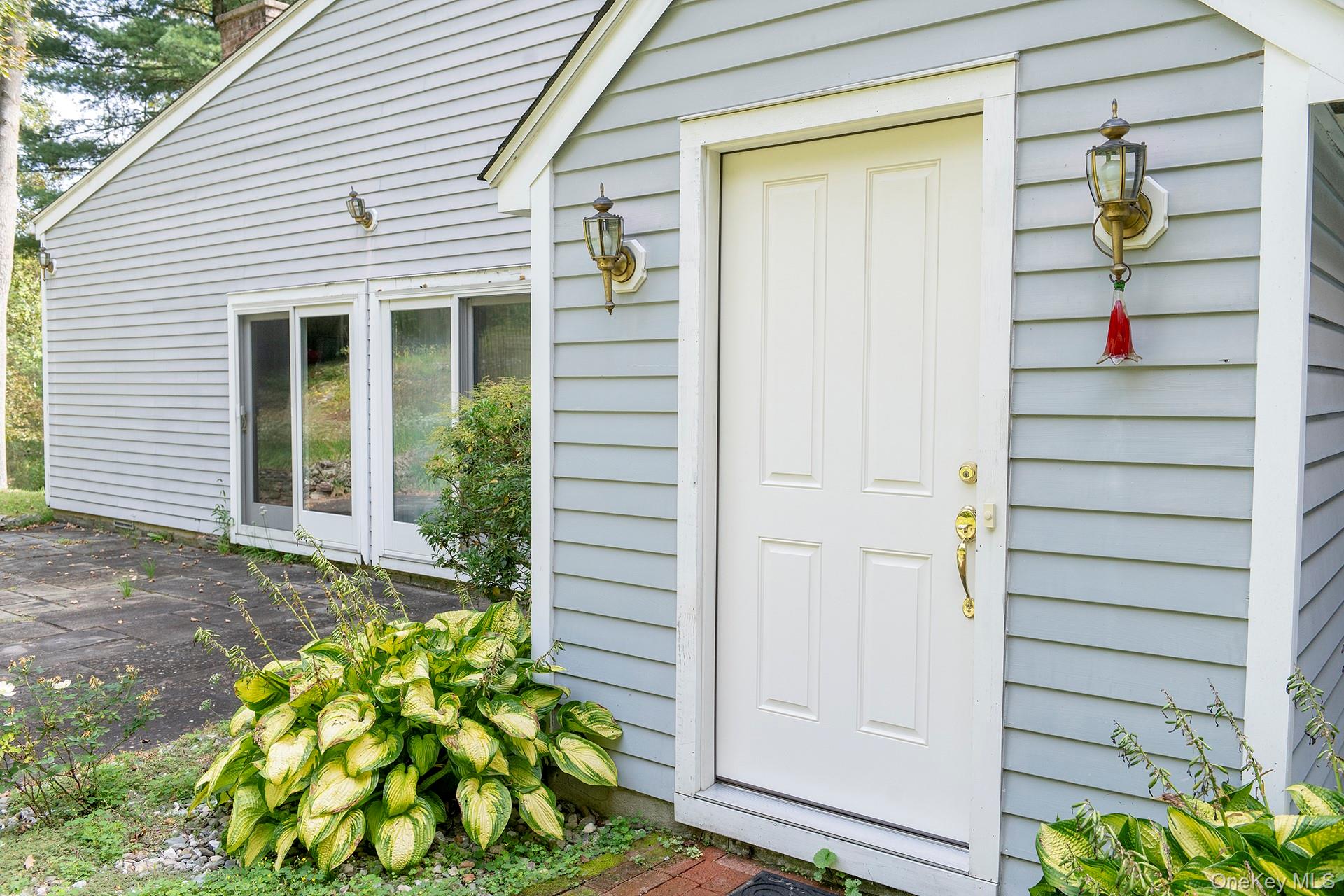 28 Clinton Corners Road Salt Point, NY 12578 - Photo 6 of 41 a front view of a house with a yard