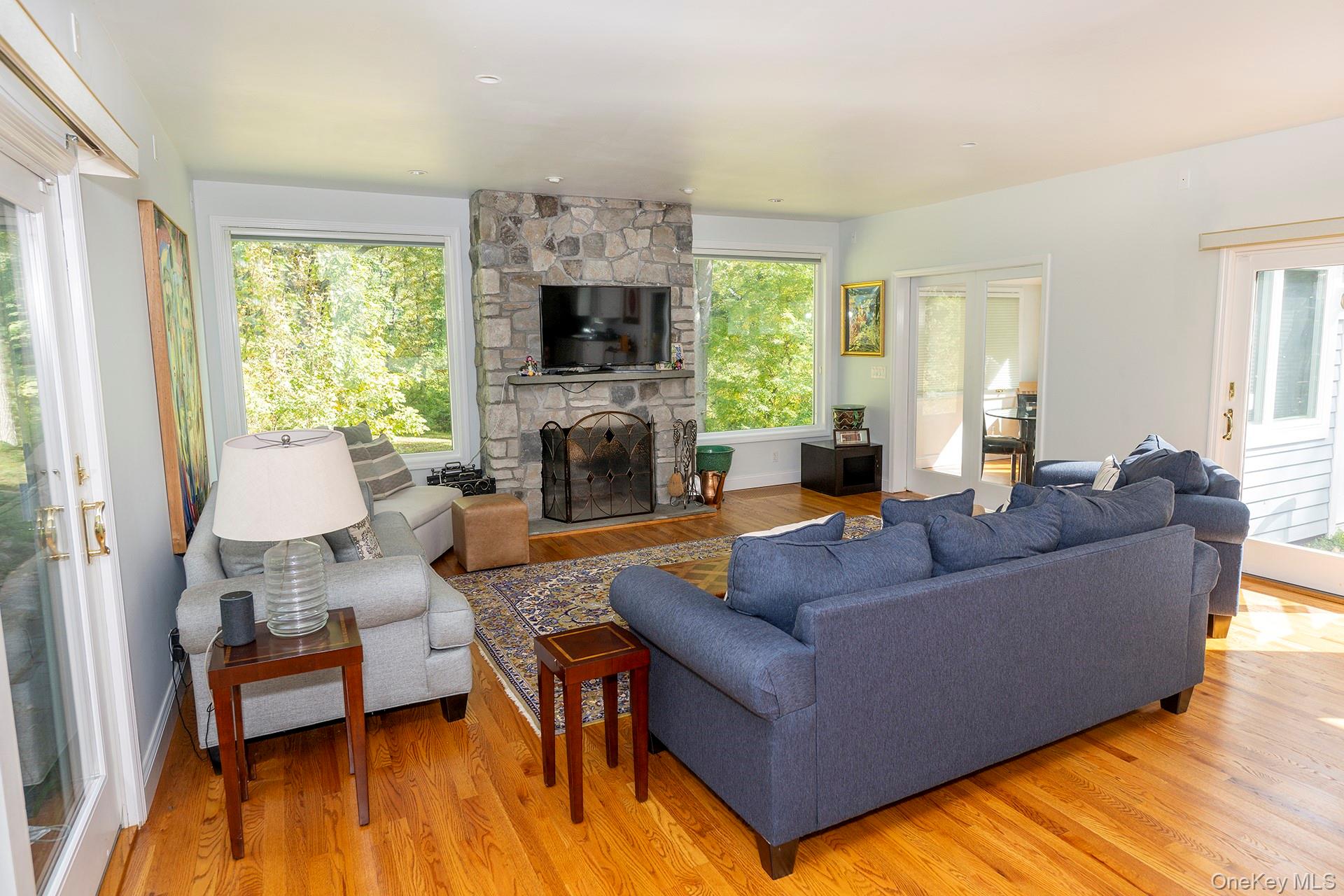 28 Clinton Corners Road Salt Point, NY 12578 - Photo 7 of 41 a living room with furniture and a fireplace